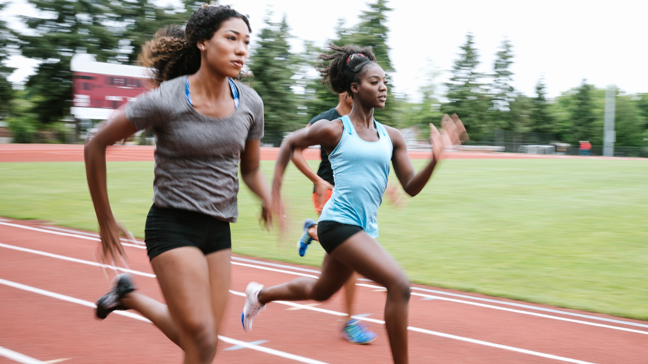 Women running on a running track