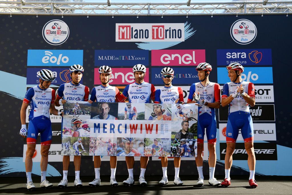MILAN ITALY OCTOBER 06 Thibaut Pinot of France Matteo Badilatti of Switzerland William Bonnet of France David Gaudu of France Matthieu Ladagnous of France Sebastien Reichenbach of Switzerland Attila Valter of Hungary and Team Groupama FDJ during the team presentation prior to the 102nd MilanoTorino 2021 a 190km race from Magenta to Torino Superga 669m MilanoTorino on October 06 2021 in Milan Italy Photo by Tim de WaeleGetty Images