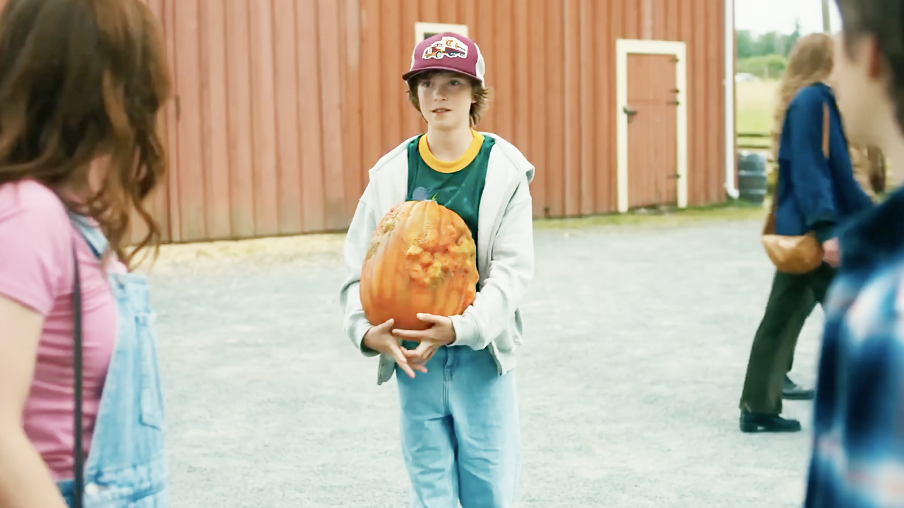 Bean Reid carrying the cursed pumpkin in R.L. Stine&#039;s Pumpkinhead (2025).