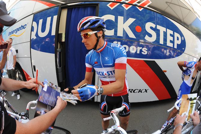 French national champion Sylvain Chavanel enjoys signing some autographs at the 2011 Tour de France