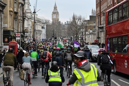 A large group of protesters and Big Ben