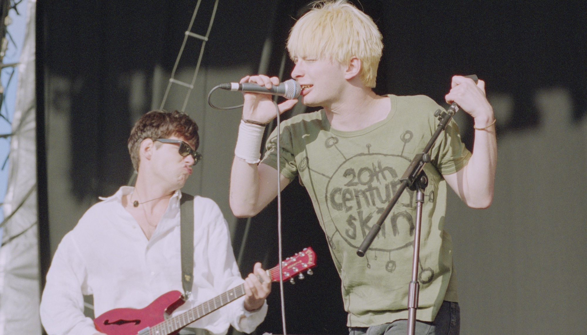 Radiohead&#039;s Ed O&#039;Brien (left) and Thom Yorke perform onstage at the 1994 Reading Festival in England on August 27, 1994