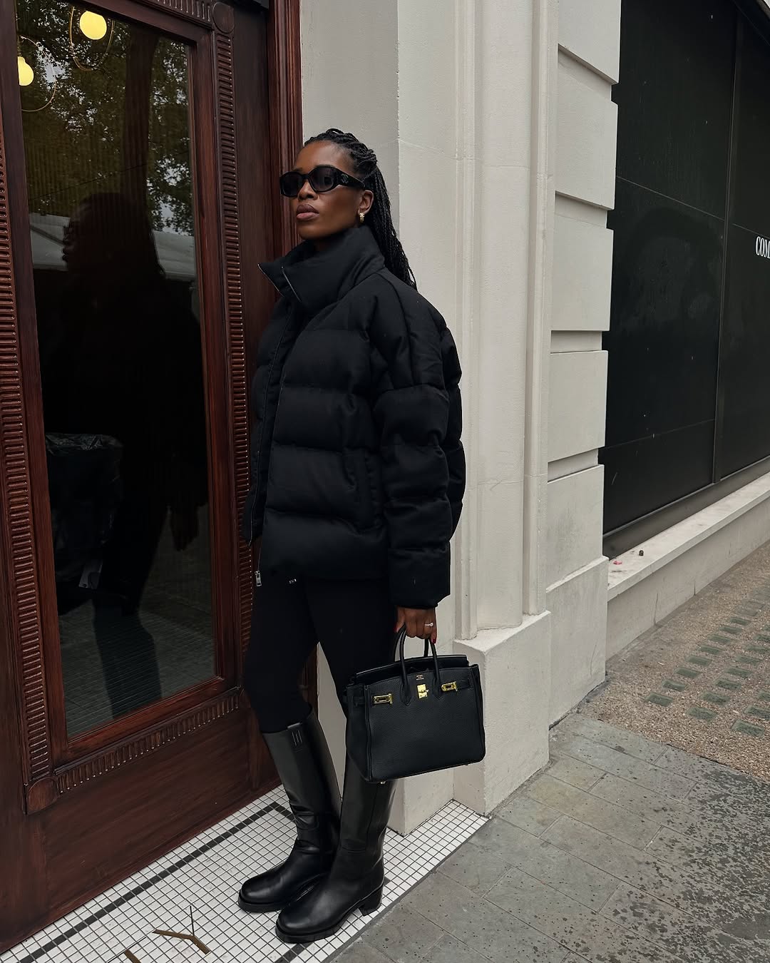 woman wearing wearing puffer coat outfit 2025