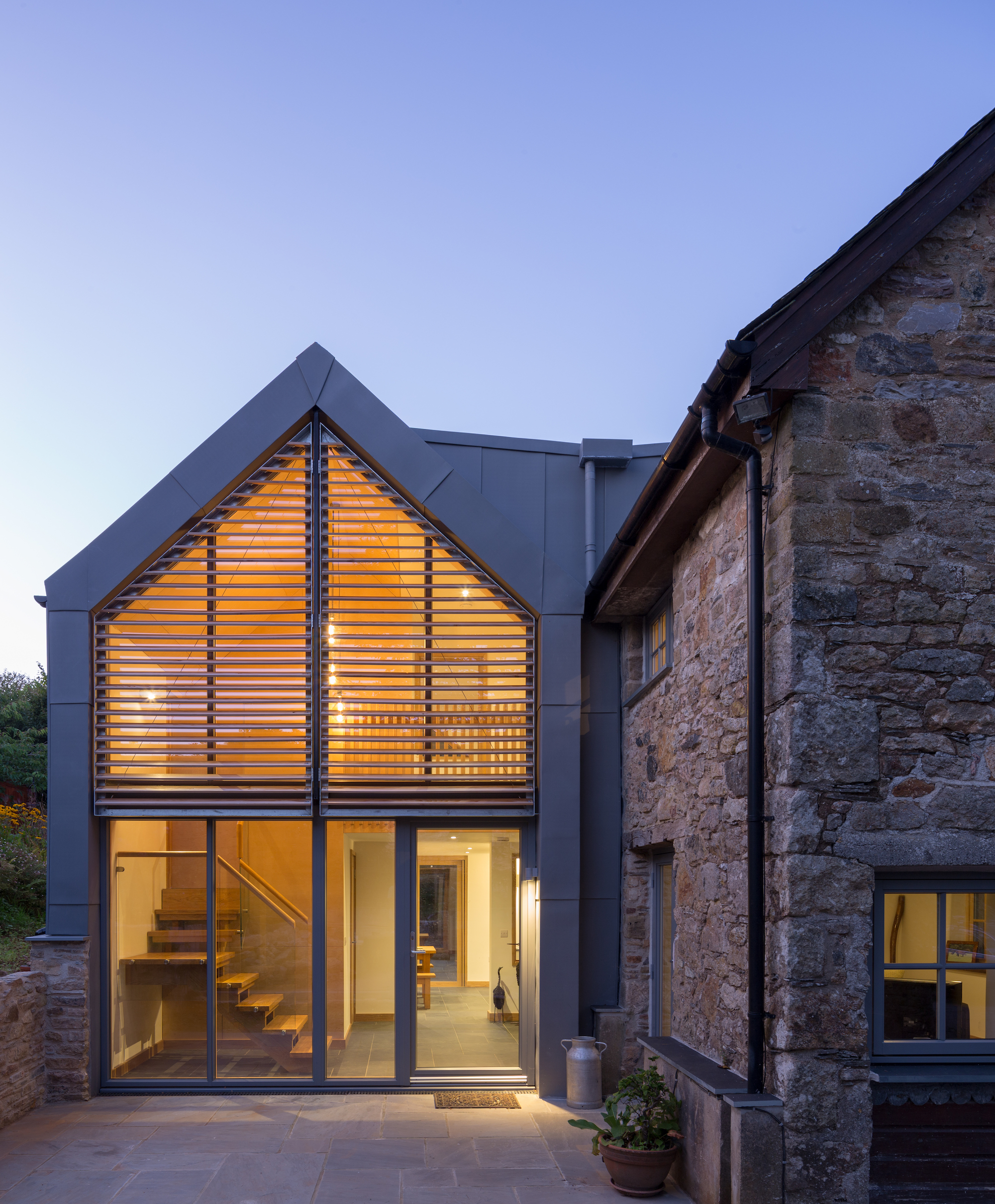 large extension to barn conversion with zinc roof