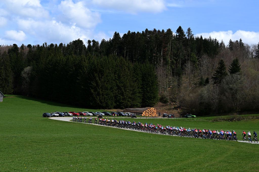 LA CHAUXDEFONDS SWITZERLAND APRIL 27 A general view of the peloton passing through a landscape during the 76th Tour De Romandie 2023 Stage 2 a 1627km stage from Morteau to La ChauxdeFonds UCIWT on April 27 2023 in La ChauxdeFonds Switzerland Photo by Dario BelingheriGetty Images