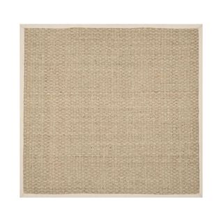 A square brown jute rug with a white border