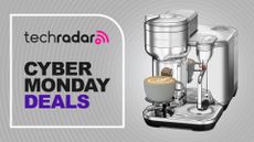 Nespresso machine on gray background with text reading "TechRadar Cyber Monday Deals"