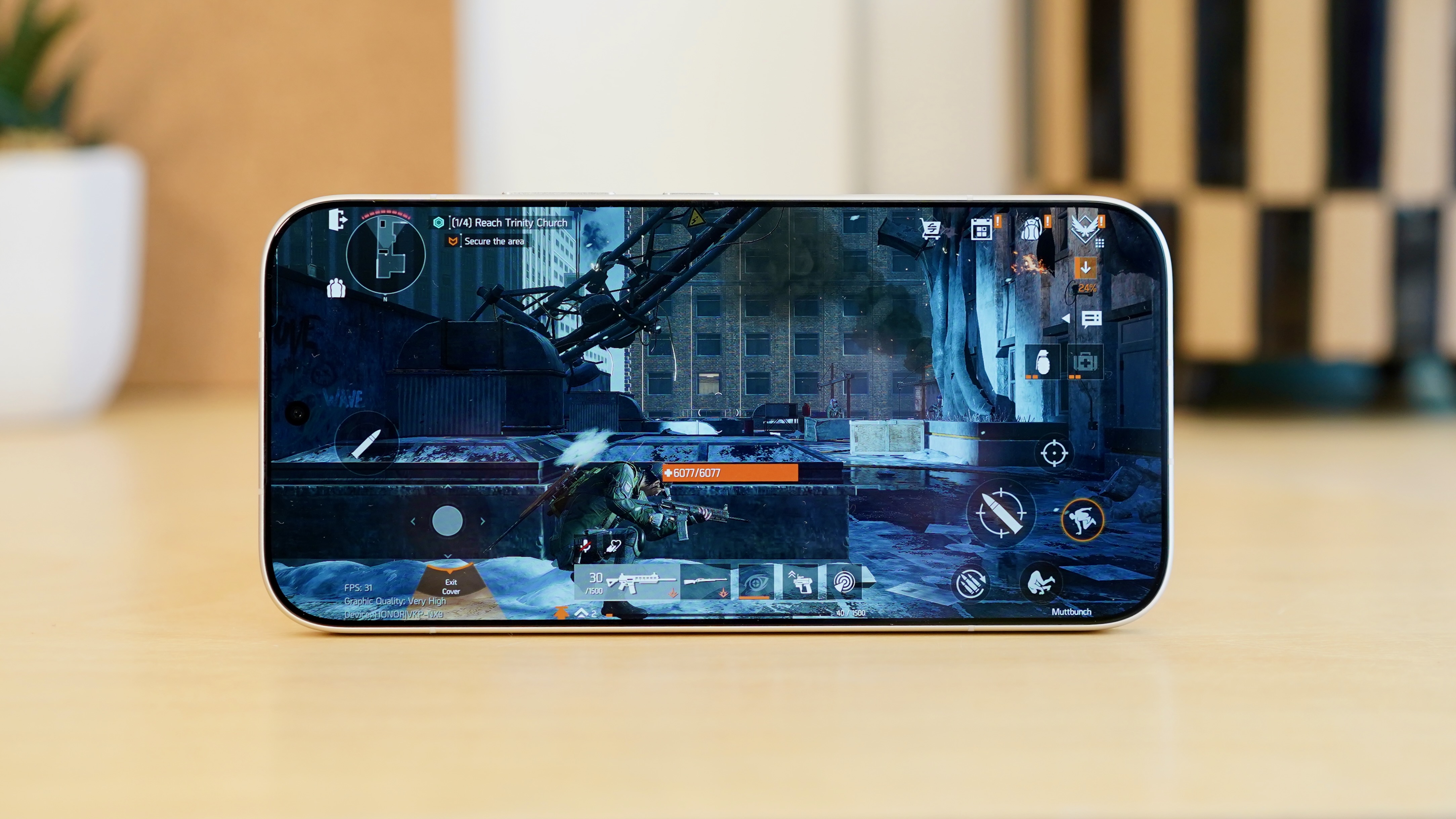 A white Honor 600 Pro resting on a wooden table