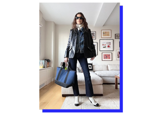Leandra Medine Cohen in a shirt sandwich featuring a leather jacket, jean jacket, and ascot.