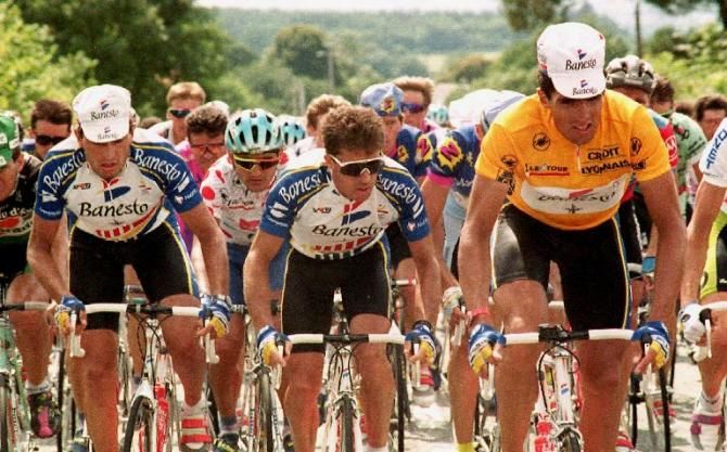 Miguel Indurain (Banesto) in yellow at the 1992 Tour de France with teammates Marino Alonso (left) and Pedro Delgado (center)
