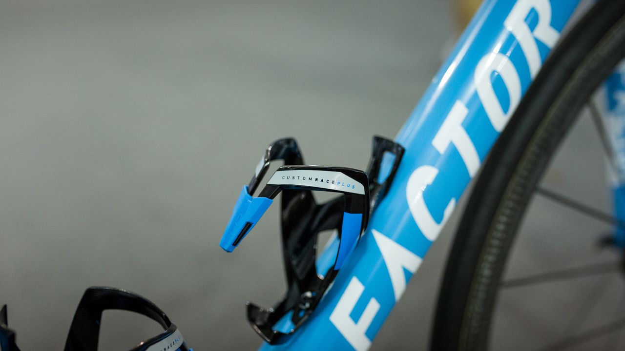 Colour-coordinated Elite Custom Race Plus bottle cages for the team