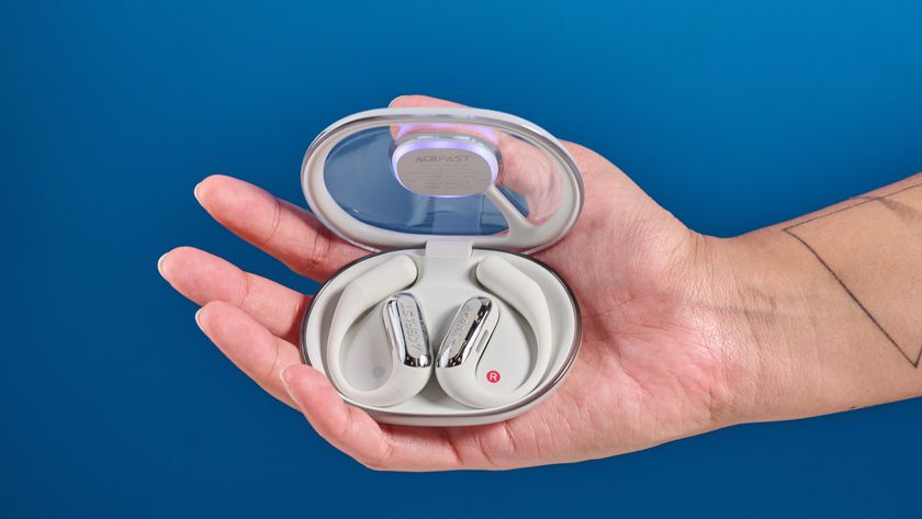 AceFast AceFit Pro open earbuds and the light up charging case photographed in front of a blue background.