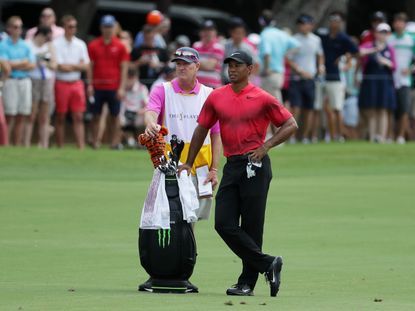 Golfer Pays $50,000 To Caddie For Tiger Woods
