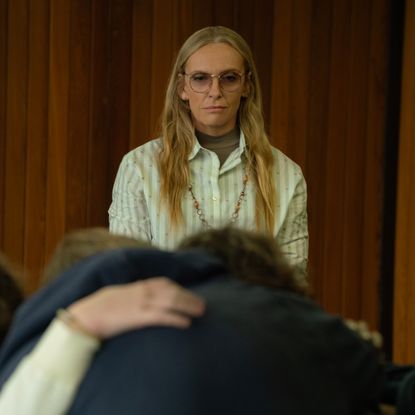 toni collette as evelyn looking at a group of teenagers embracing in wayward
