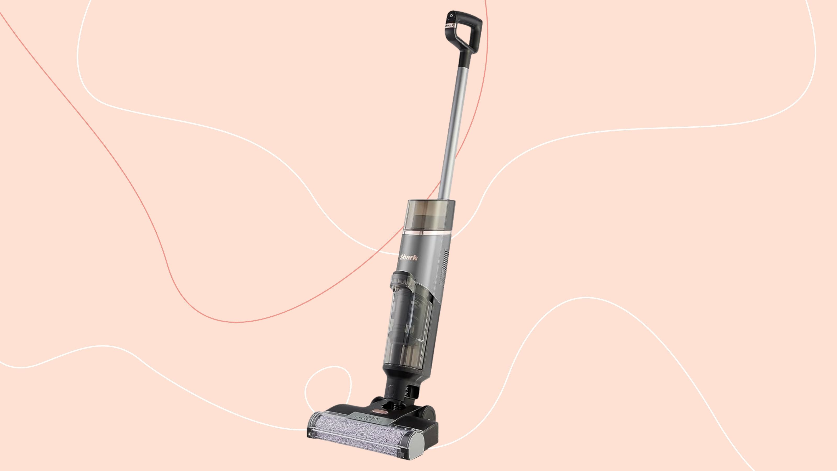 Shark HydroVac Cordless Hard Floor Cleaner on a pink background