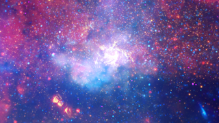 A multiwavelength composite image of the heart of the Milky Way, about where a supermassive black hole resides.