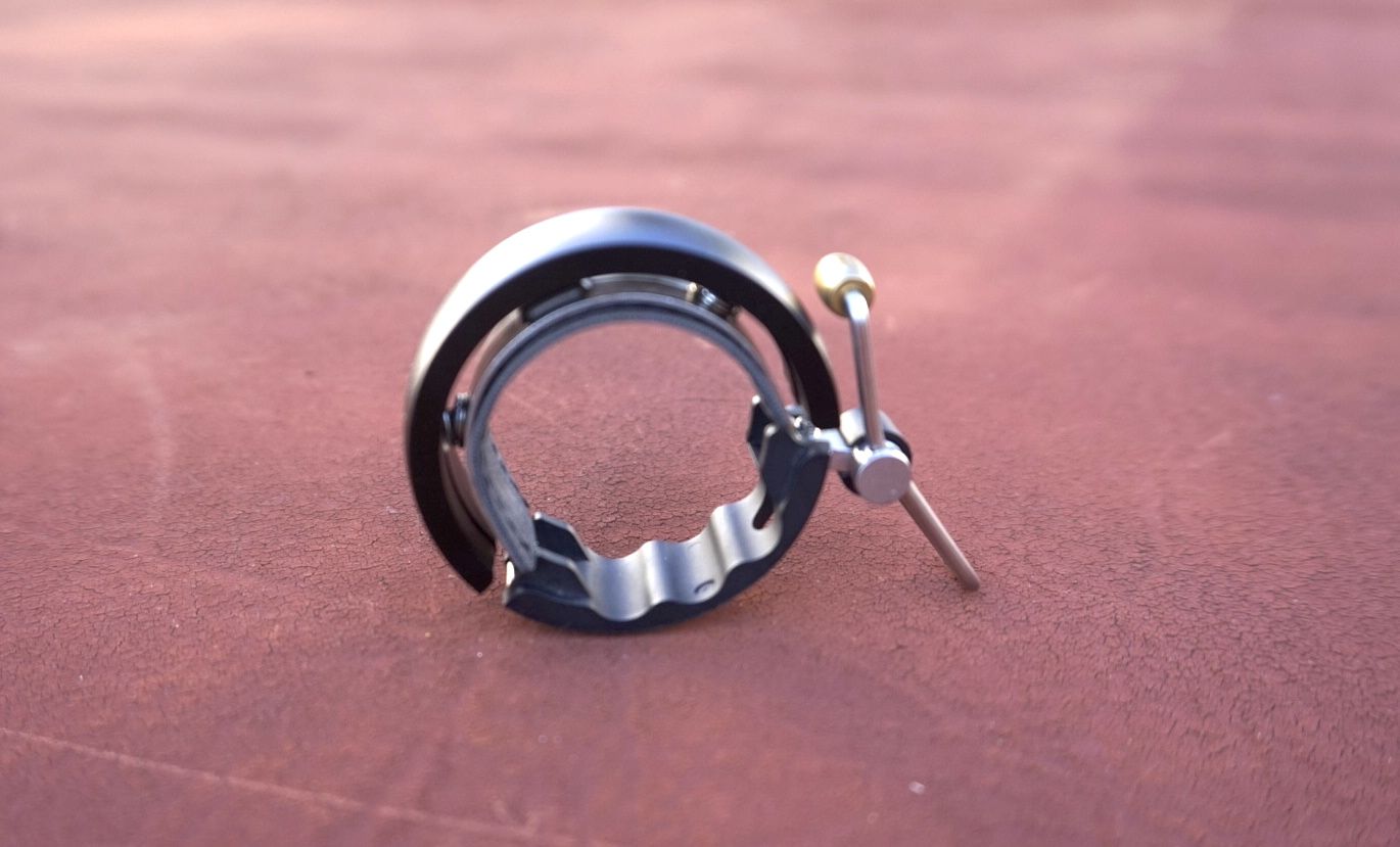 Knog Oi Luxe which is one of the best bike bells for cycling