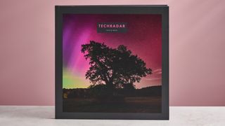 The cover of TechRadar's Papier photo book, featuring a tree in front of an aurora.
