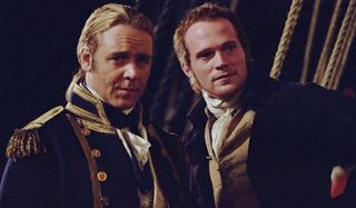 Master and Commander: Far Side of the World Russell Crowe and Paul Bettany in uniform, on deck