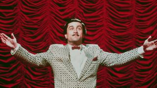 Wannabe stand-up comedian Rupert Pupkin (Robert De Niro) on stage in The King of Comedy.