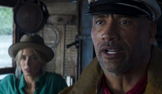 Dwayne Johnson and Emily Blunt look ready for danger in Jungle Cruise.