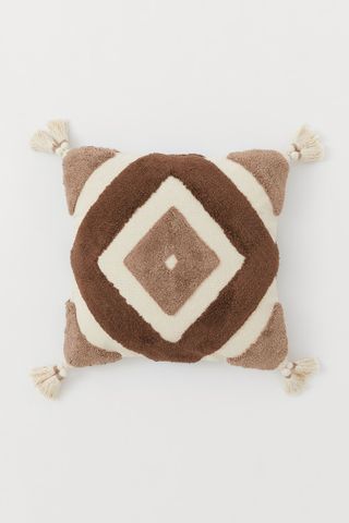 H&M home tasselled brown print cushion