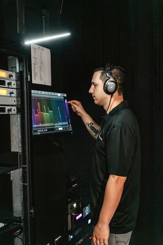 Walter Wilson, Church Unlimited’s Lead Production Director, accessing KLANG:konductor’s IEM monitor mixes via a touch screen running KLANG:app.