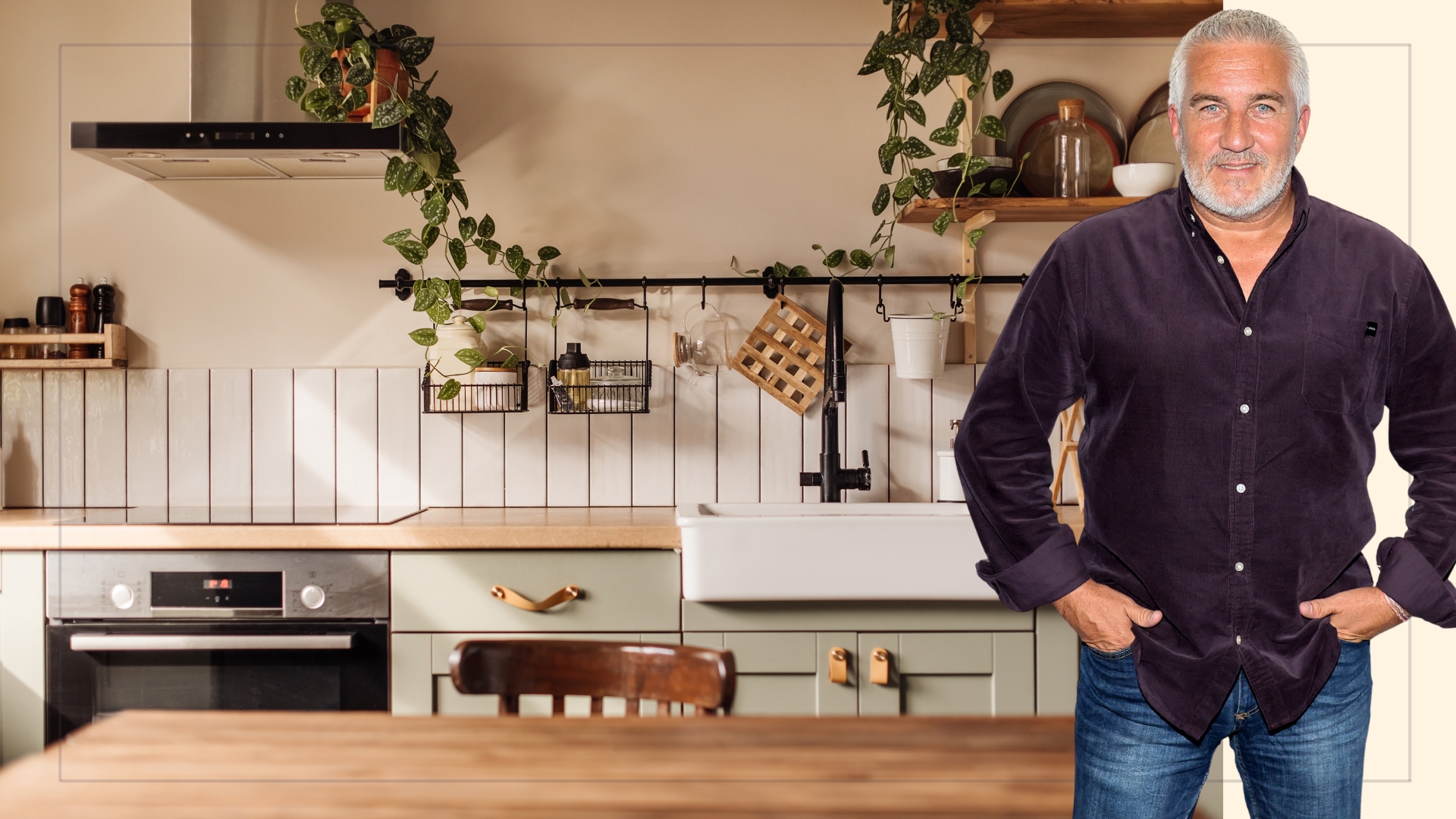 Paul Hollywood's stood in front of a warm tidy kitchen