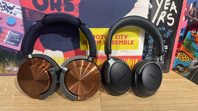 Dyson OnTrac next to Bose QuietComfort Ultra Headphones against colourful record covers