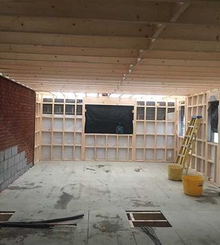 kitchen extension with wood frames in