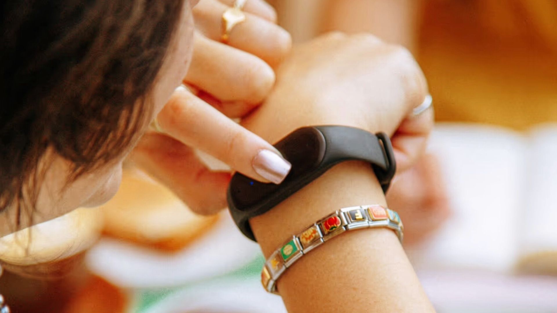 an image of the black bee watch / bracelet round a womans wrist