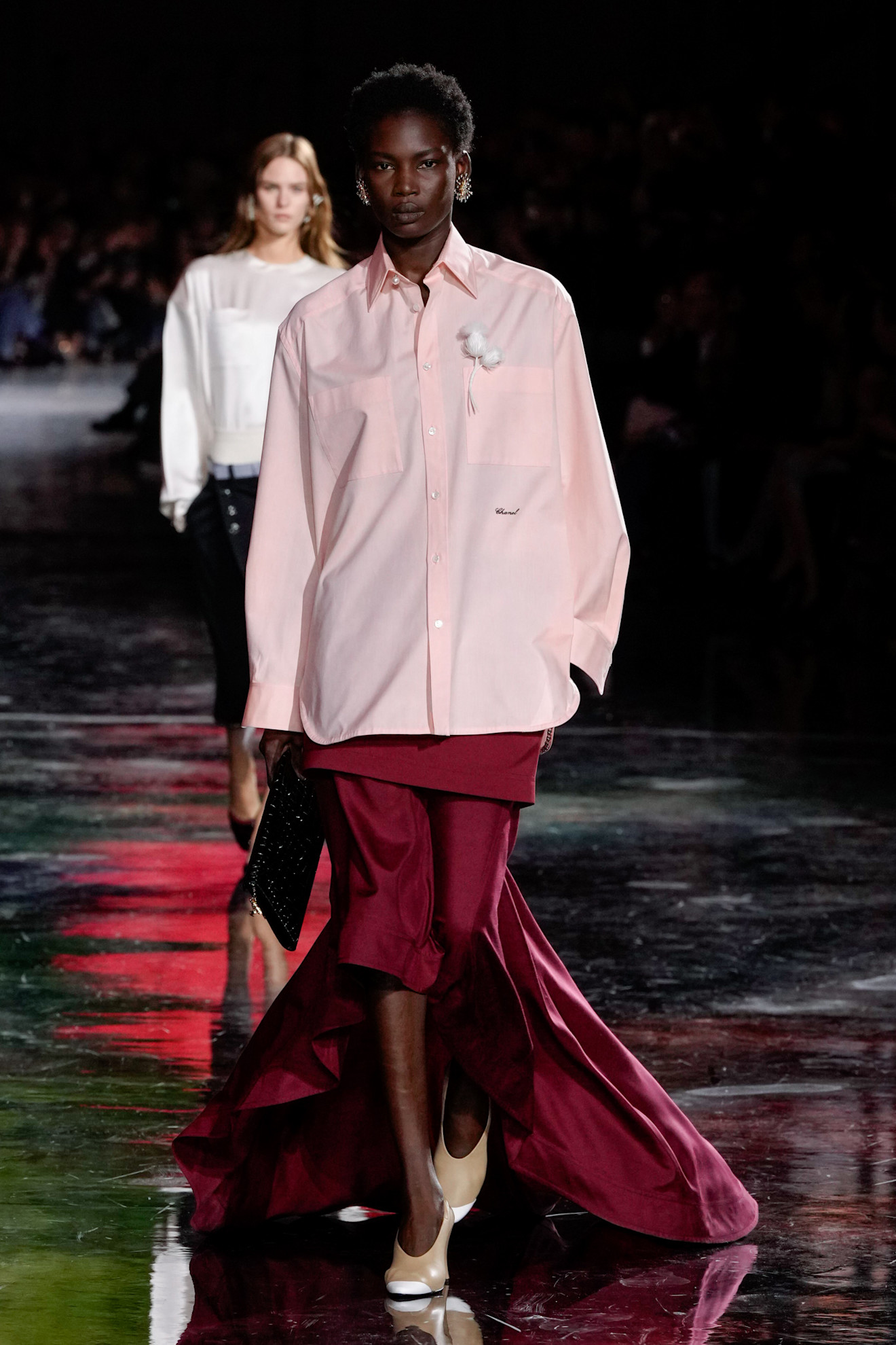 a model in color contrasting clothes from the new chanel collection