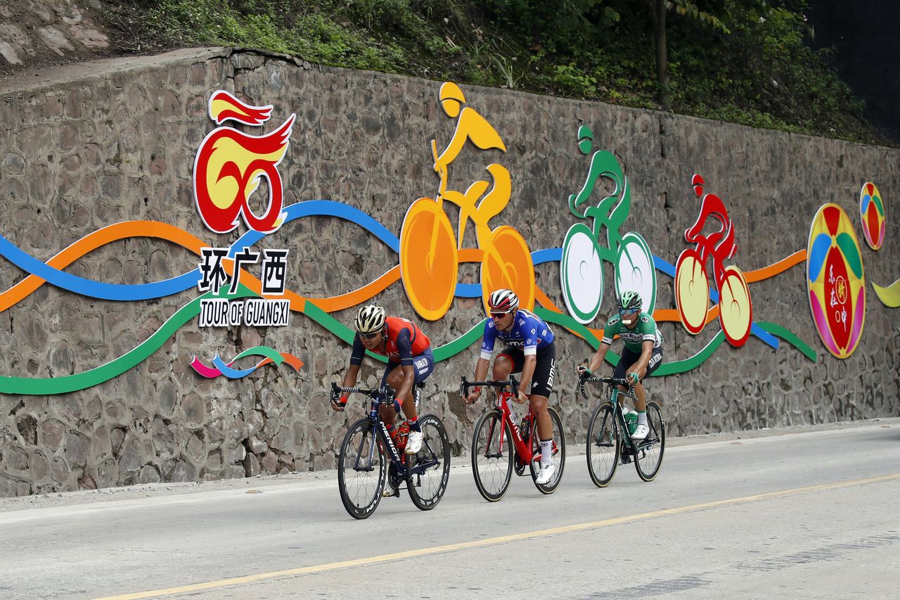 The breakaway passes some art work on the side of the road