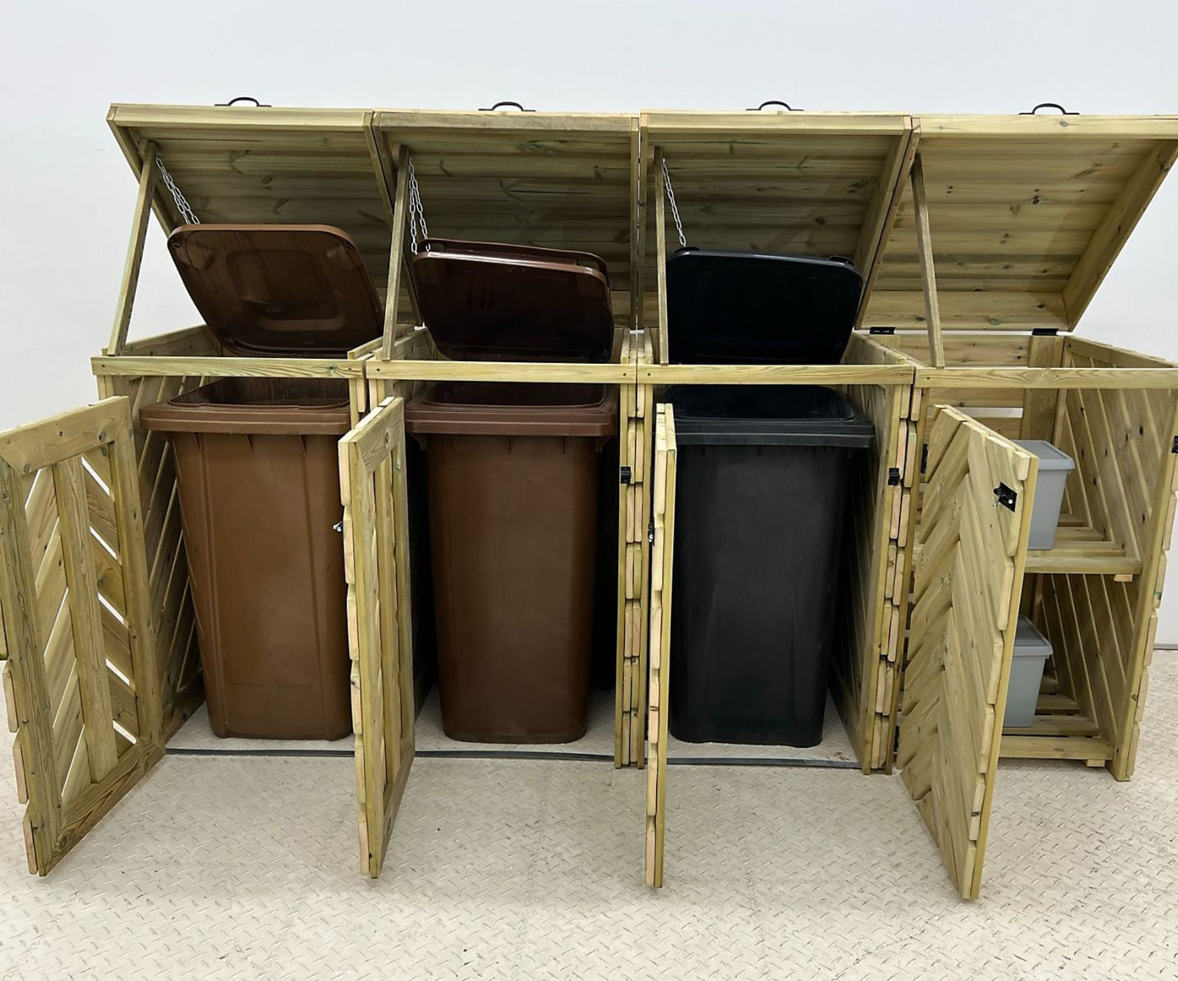 wooden triple bin store with section on side for smaller recycling boxes, lift up lids and opening front doors on all sections