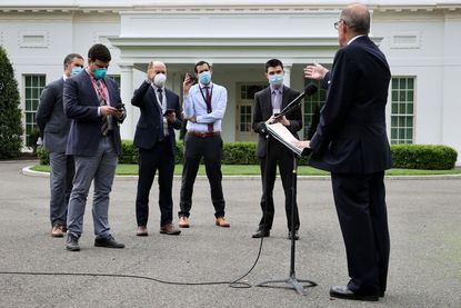 White House Economic Council Director Larry Kudlow talks to reporters on May 08, 2020 in Washington, DC