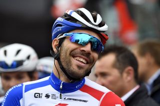 Thibaut Pinot smiles at the start