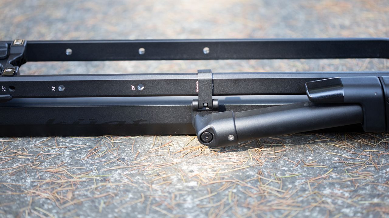 Best rooftop bike rack - Kuat Piston SR wheel hoop lock