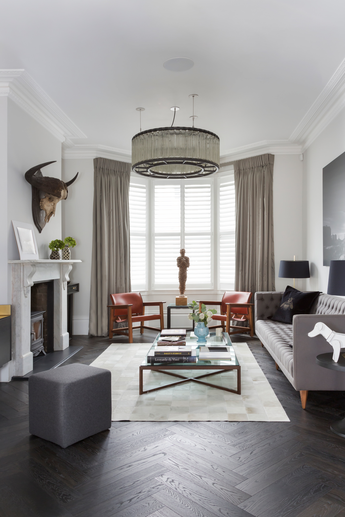 White living room with bay window and western style decor