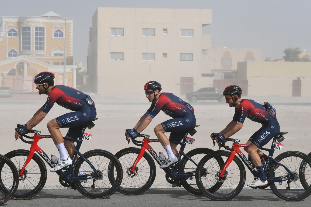 ABU DHABI UNITED ARAB EMIRATES FEBRUARY 21 LR Filippo Ganna of Italy Adam Yates of United Kingdom and Elia Viviani of Italy and Team INEOS Grenadiers compete during the 4th UAE Tour 2022 Stage 2 a 176km stage from Hudayriyat Island to Abu Dhabi Breakwater UAETour WorldTour on February 21 2022 in Abu Dhabi United Arab Emirates Photo by Tim de WaeleGetty Images