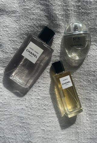 Chanel perfumes on textured fabric