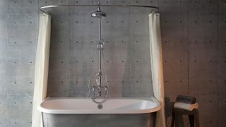freestanding bath with over bath shower
