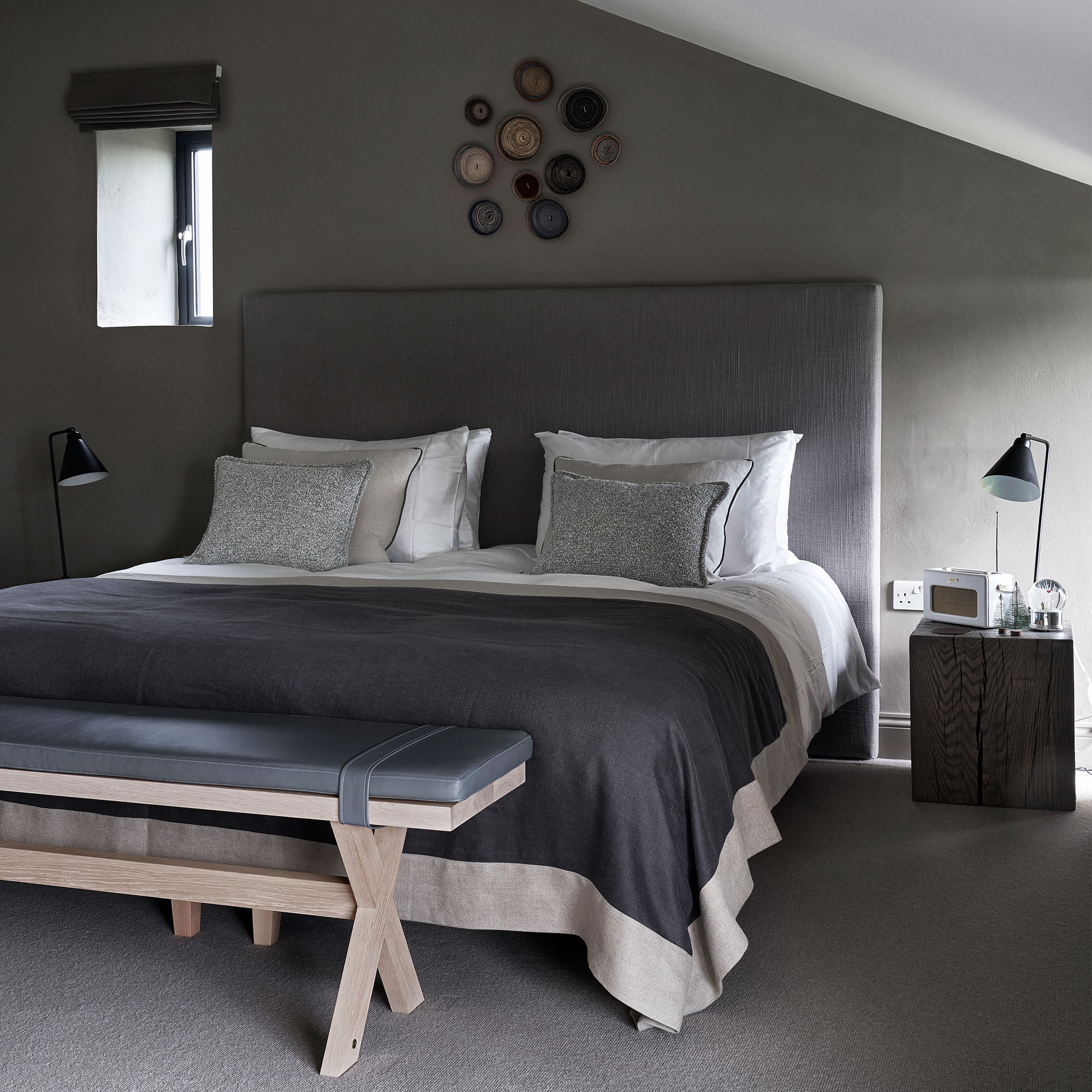 White and beige master bedroom with traditional wallpaper