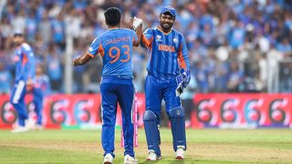 Wicket keeper Sanju Samson and Jasprit Bumrah celebrate India beating England in the T20 World Cup 2026 semifinal.
