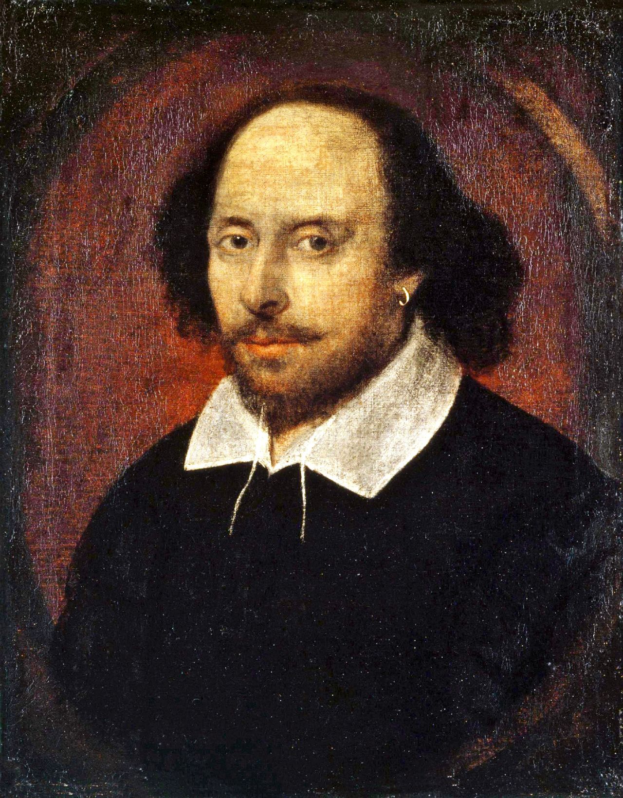 Portrait of Shakespeare, painted from the middle body up. He is pictured wearing a black coat with a white collar and a single hoop earring