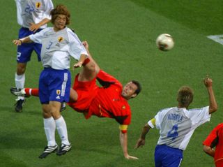 Marc Wilmots scores an overhead kick for Belgium against Japan at the 2002 World Cup.