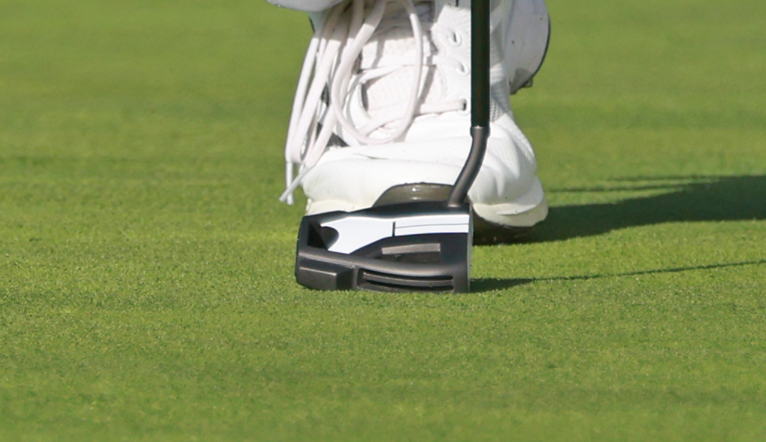 A close-up of Collin Morikawa's putter