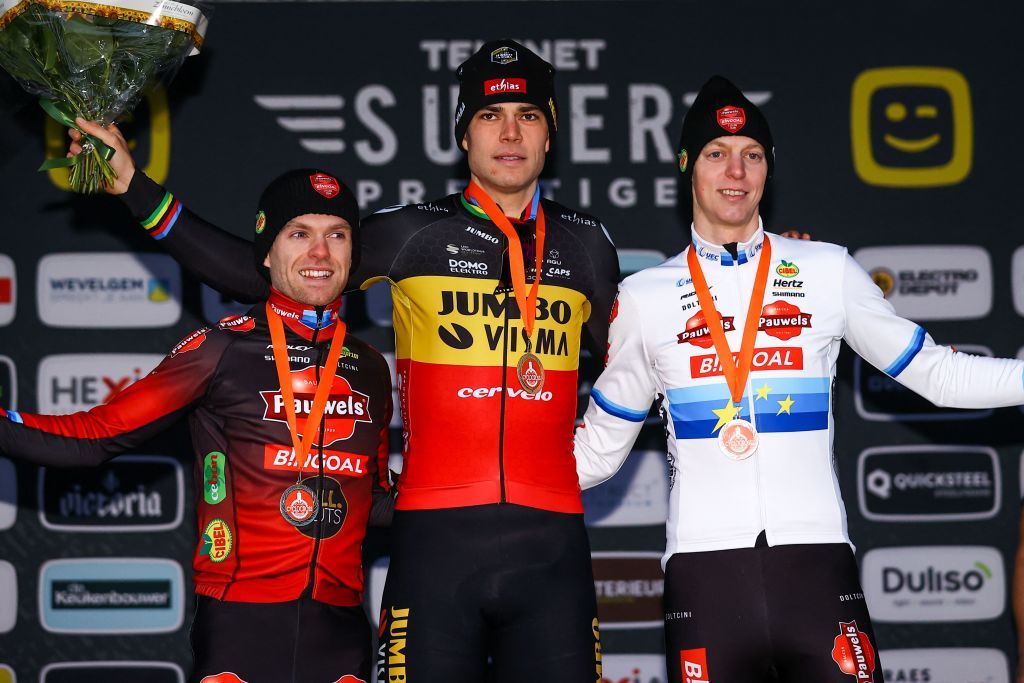 Belgian Eli Iserbyt Belgian Wout Van Aert and Belgian Michael Vanthourenhout pictured on the podium after the men elite race of the Superprestige Gullegem 7th stage out of 8 in the Superprestige cyclocross cycling competition in Gullegem Saturday 07 January 2023 BELGA PHOTO DAVID PINTENS Photo by DAVID PINTENS BELGA MAG Belga via AFP Photo by DAVID PINTENSBELGA MAGAFP via Getty Images