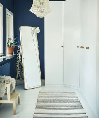 Ikea closet in blue bedroom