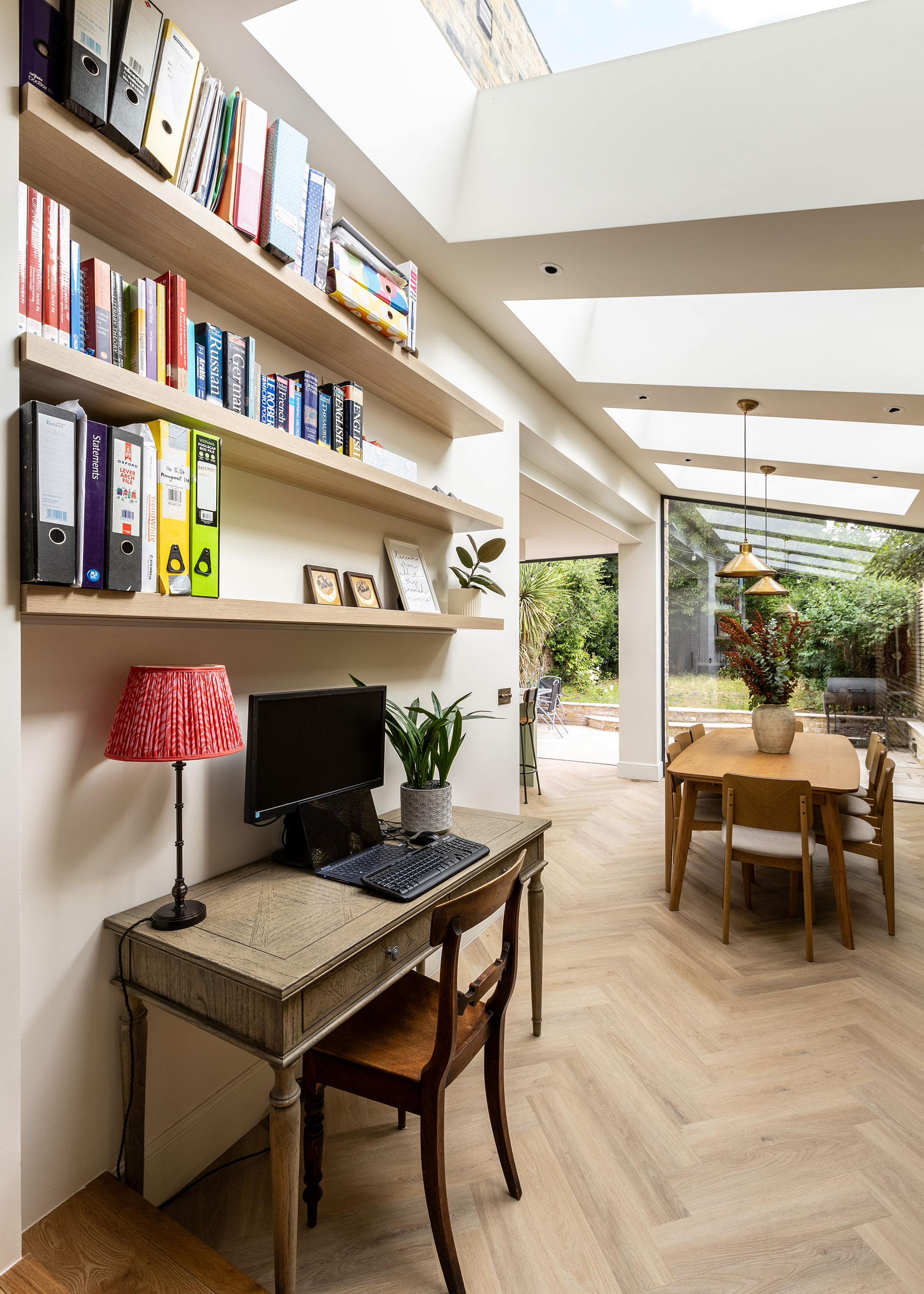 kitchen diner extension with roof glazing and full height fixed glass