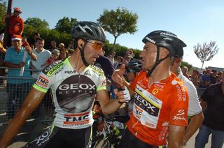 Race leader Juan Jose Cobo discusses the finish with his teammate